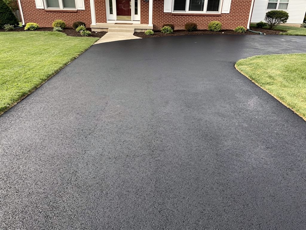 Resurfaced asphalt driveway at a McLean, VA home